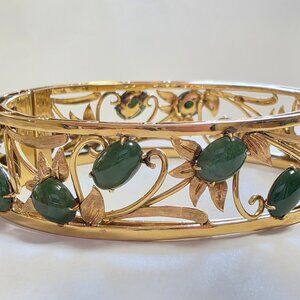 Beautiful vintage 14k Gold Bangle with dark green jade
